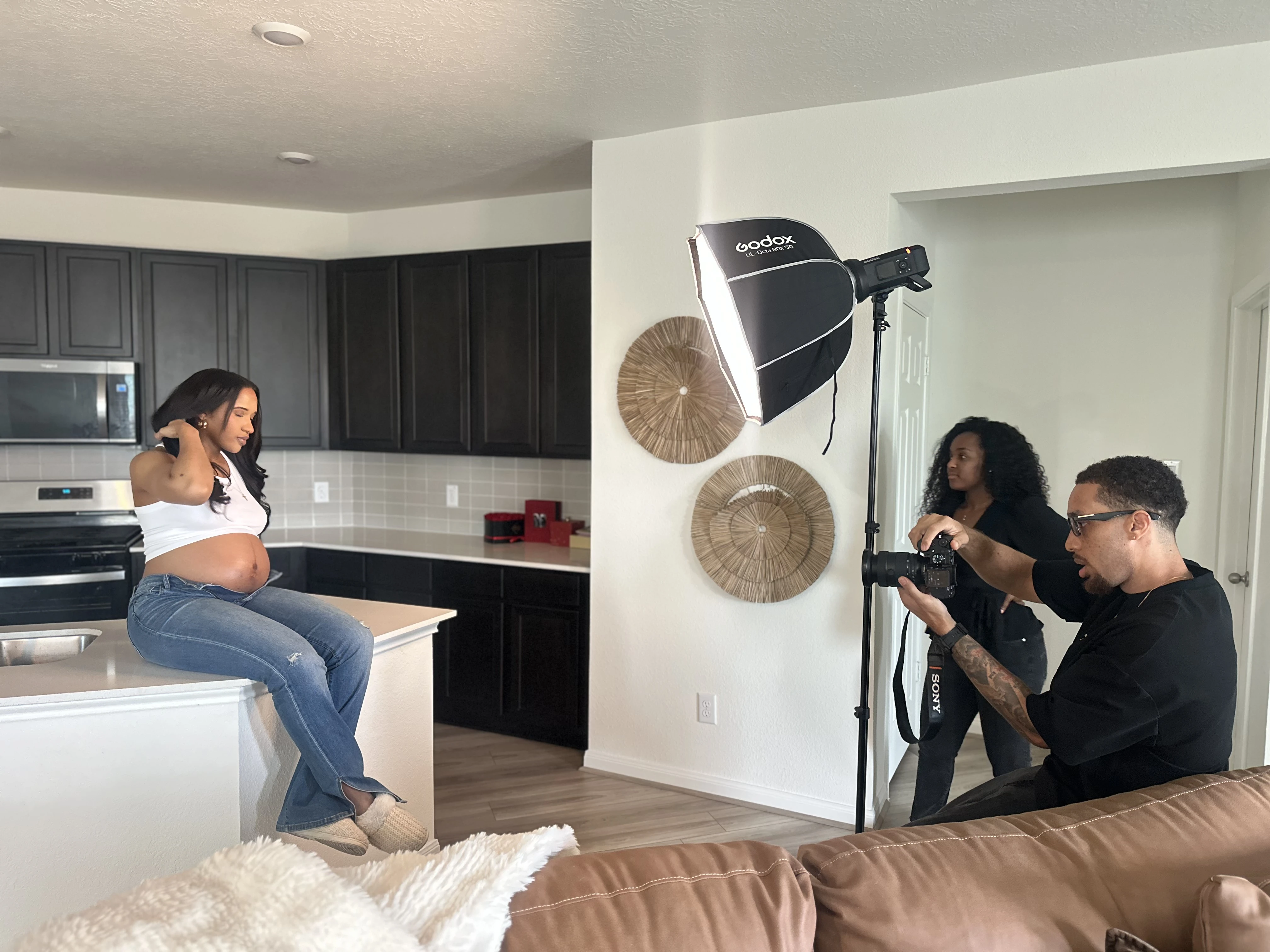 Ja'Von Williams photographing a Houston maternity session