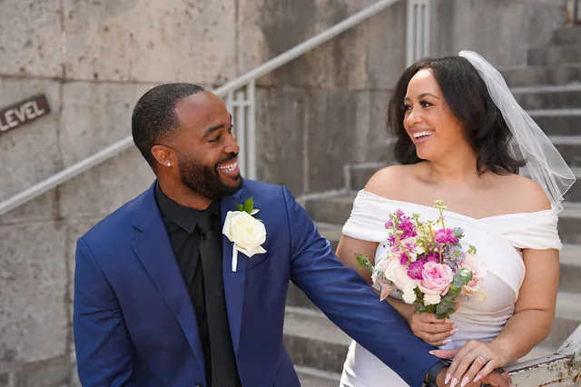Newlyweds laughing after their Houston ceremony